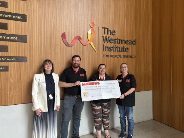 The Galston500 team handing over the 2025 donation cheque to The Westmead Institute for Medical Research